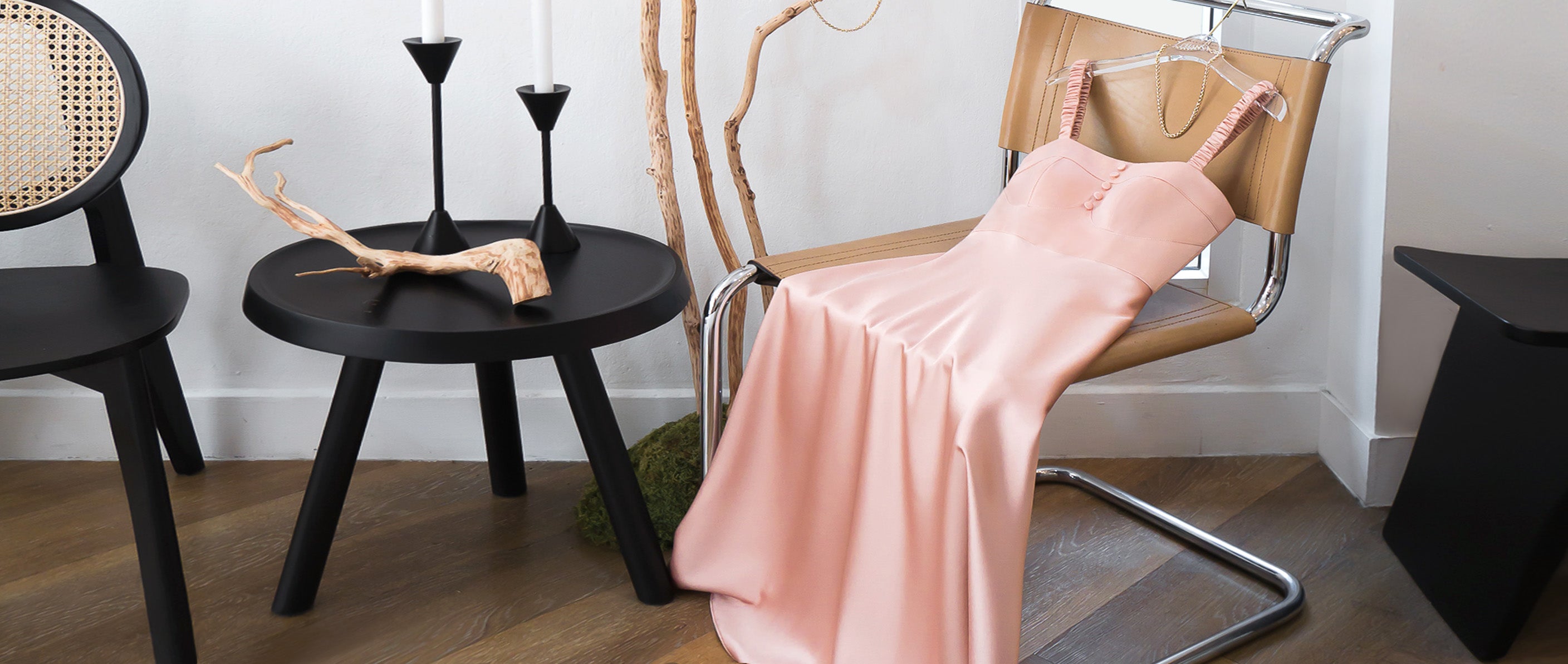 beautiful pink summer dress displayed on a chair