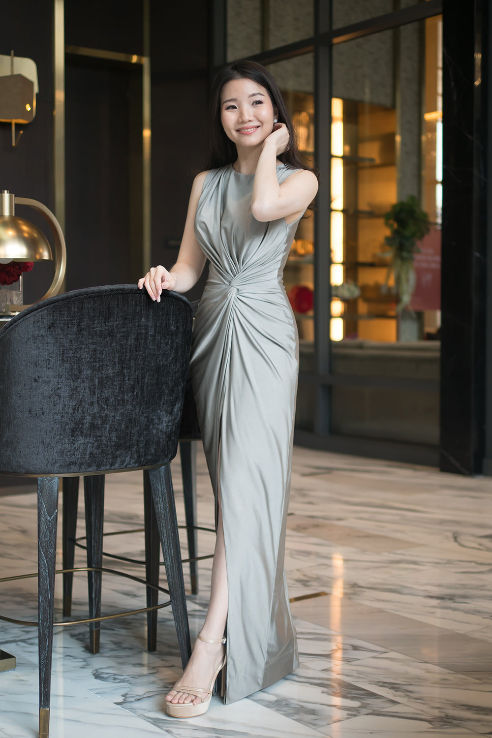 model in silver gray boat neck spandex event dress