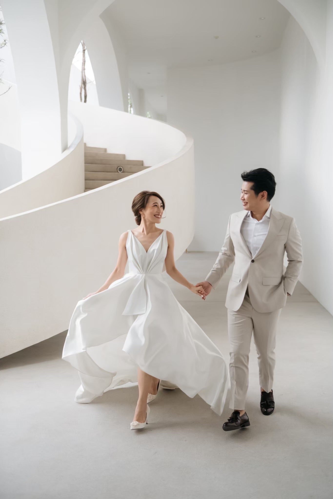 woman wearing a white v neck wedding gown 