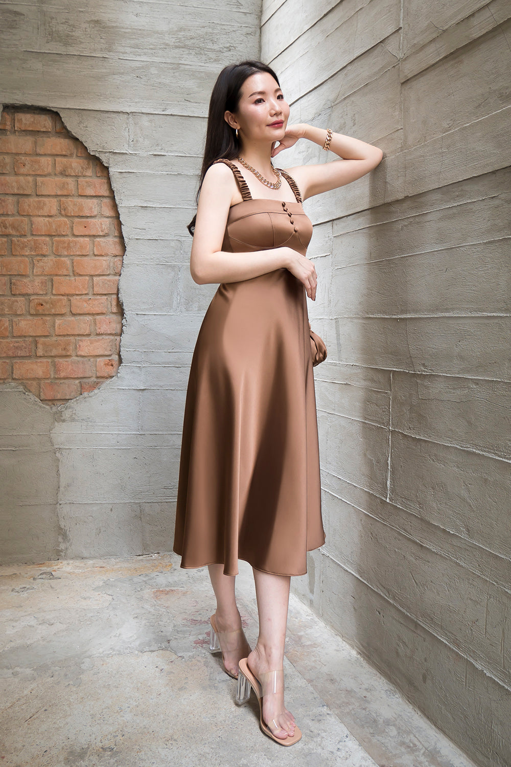 model wearing a brown bustier-inspired casual dress