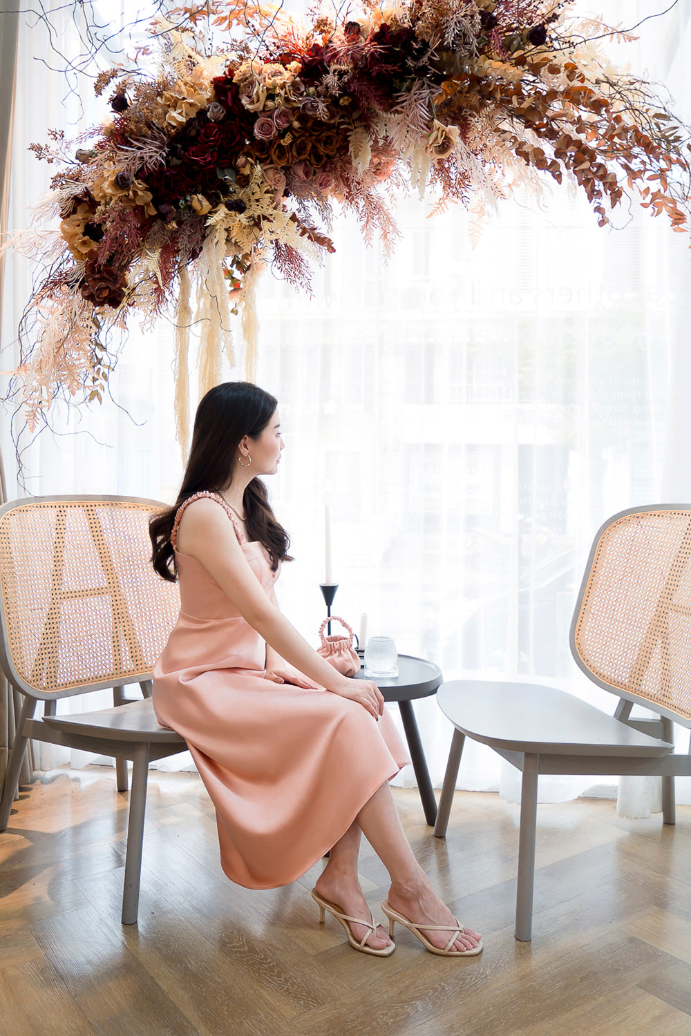 model wearing a pink bustier-inspired casual dress