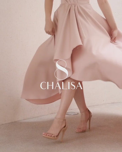 video of a model wearing a sweetheart neckline minimal wedding gown in soft nude color