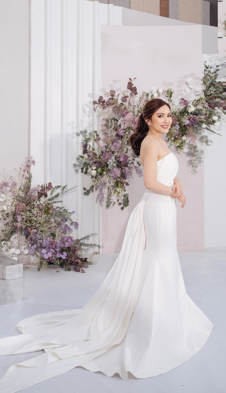 woman wearing a white strapless wedding gown