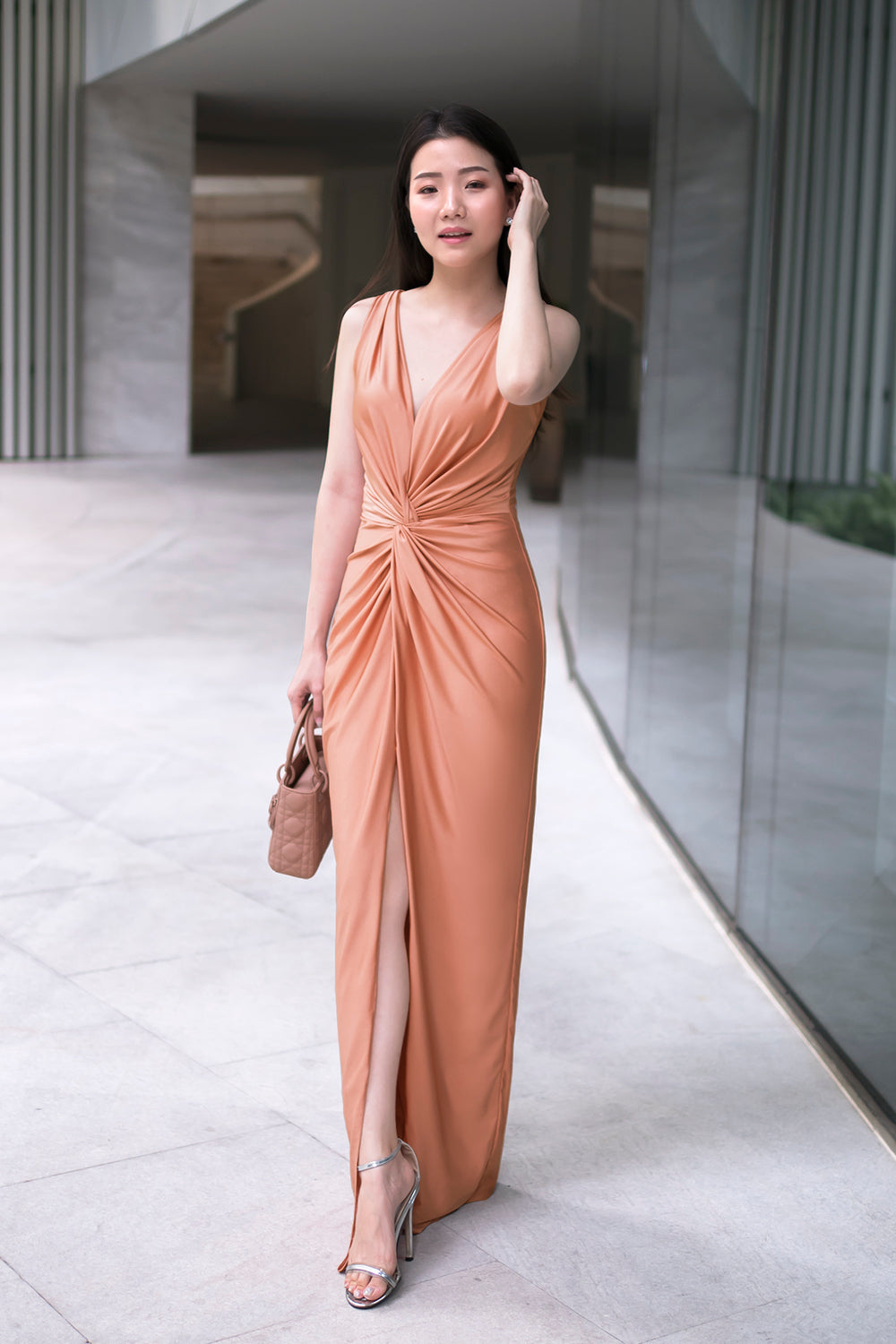 model in rose gold sleeveless v neck spandex bridesmaid dress