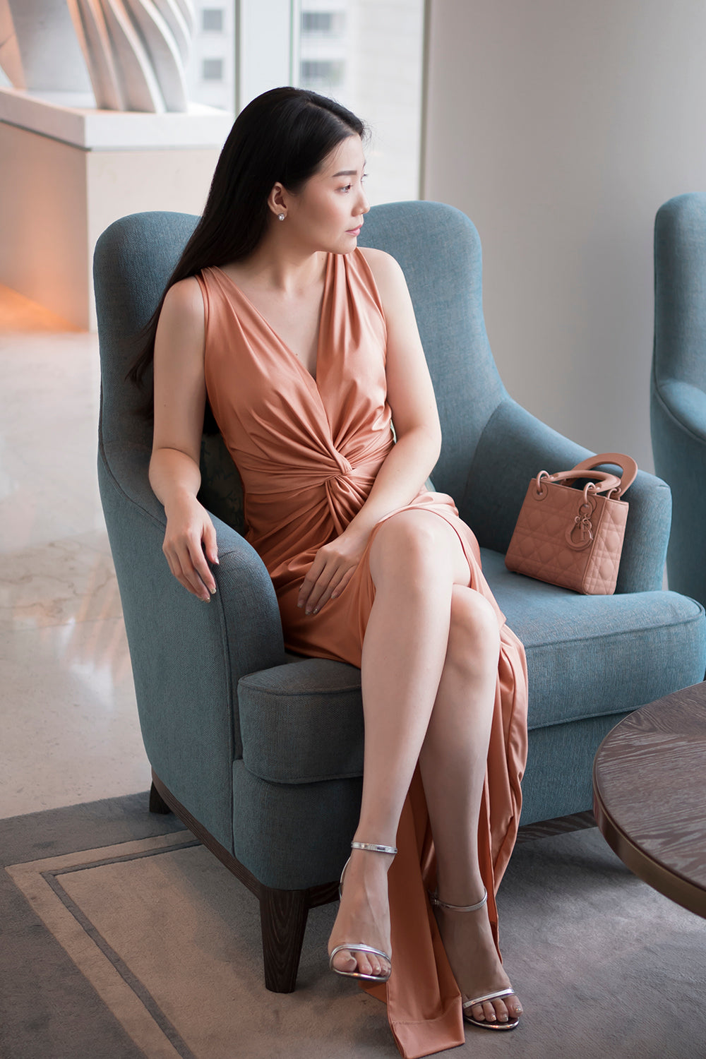 model in rose gold sleeveless v neck spandex bridesmaid dress