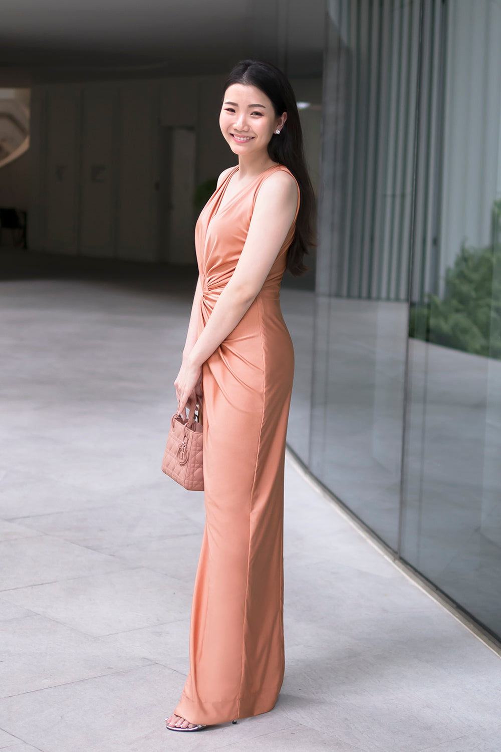 model in rose gold sleeveless v neck spandex bridesmaid dress